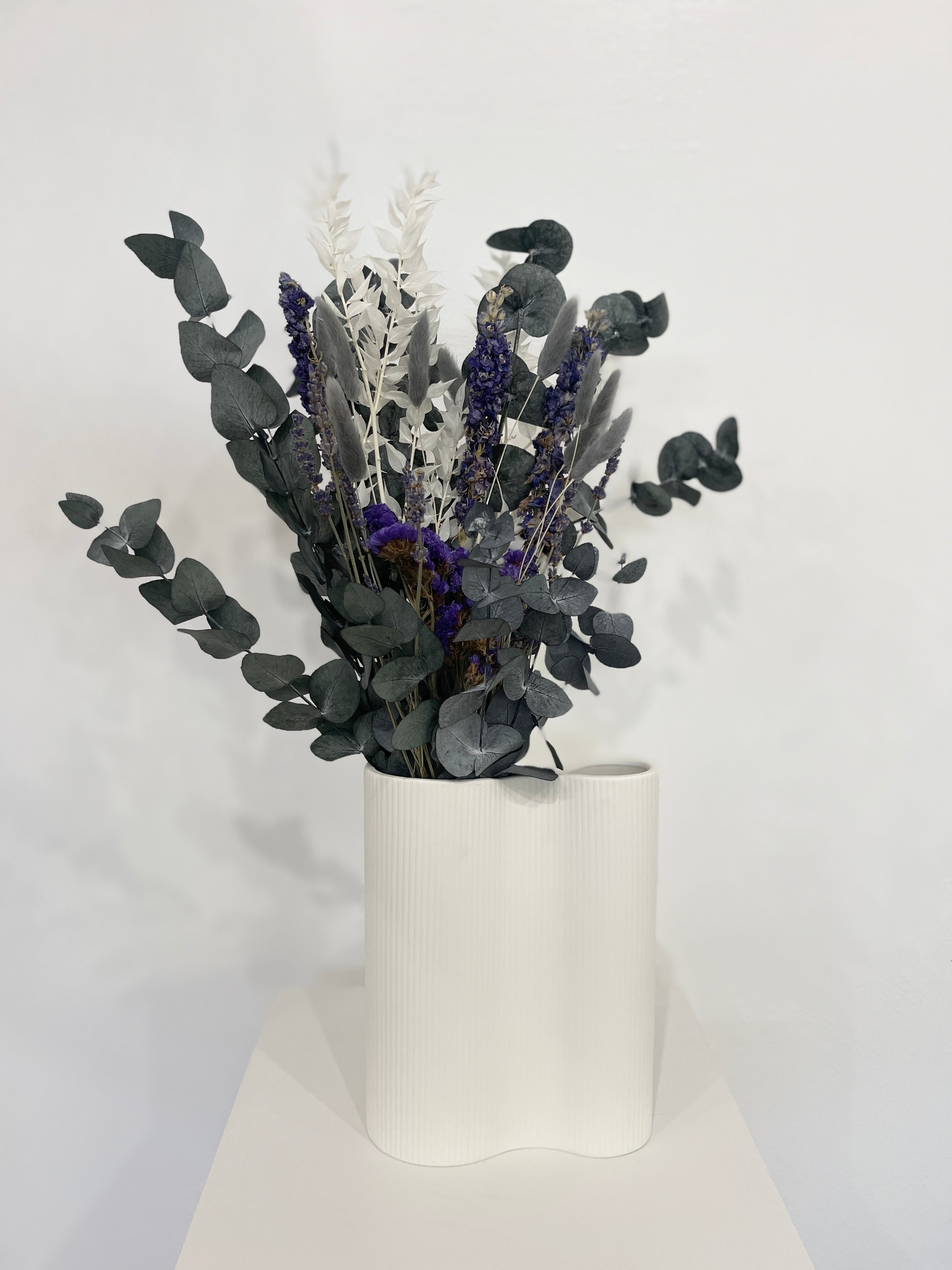 Elegant combination: loose dried flower bouquet with gypsophila and eucalyptus