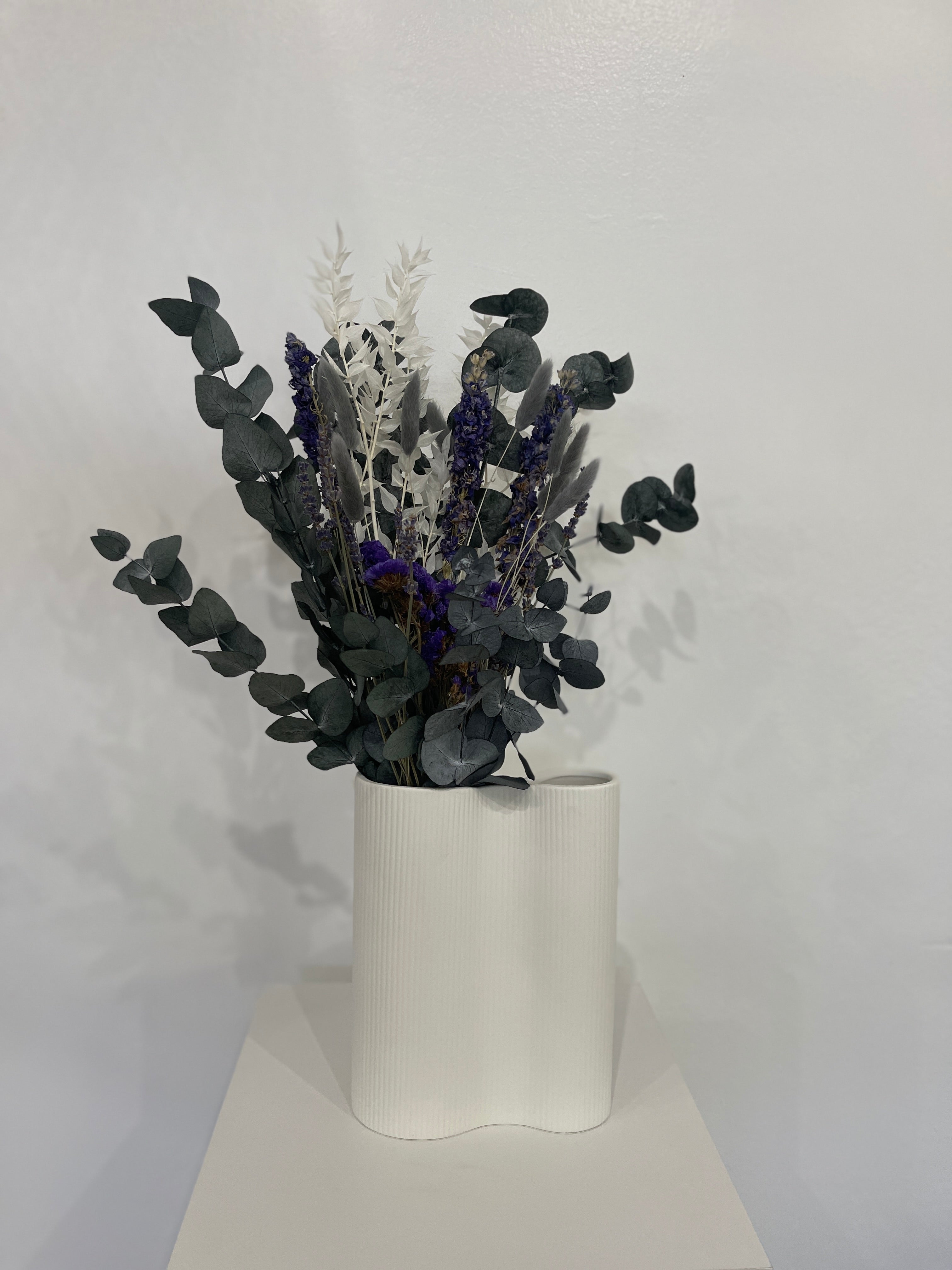 Elegant combination: loose dried flower bouquet with gypsophila and eucalyptus