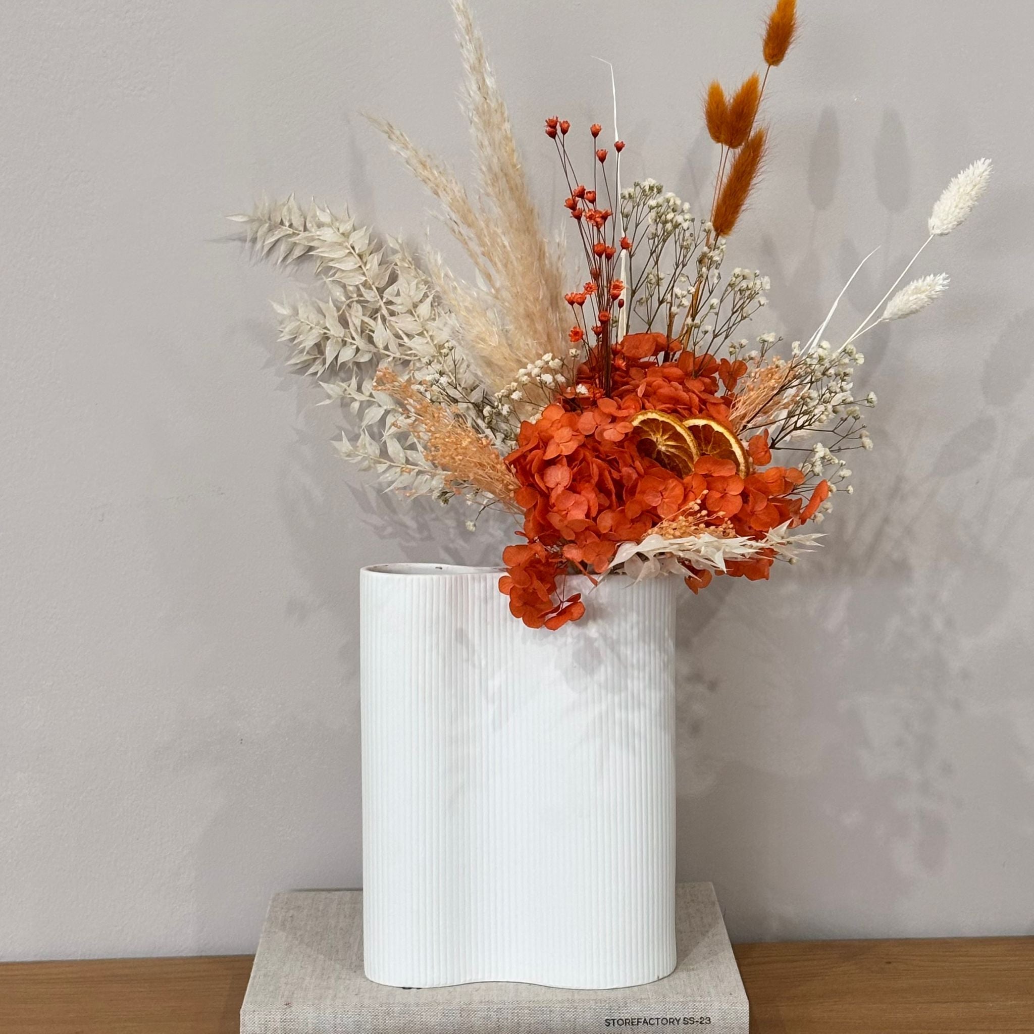 Spring Awakening: Enchanting dried flower bouquet with orange hydrangea