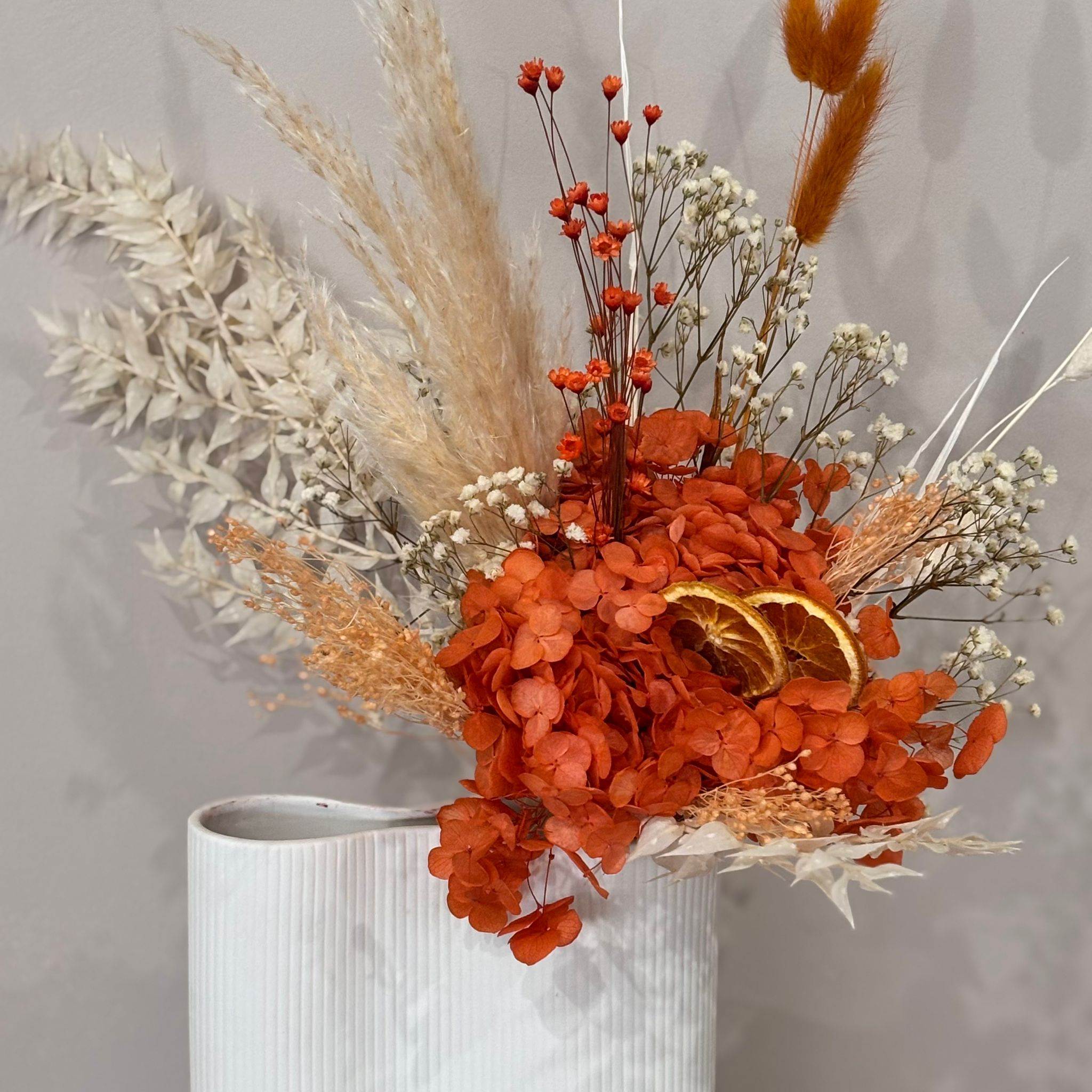 Spring Awakening: Enchanting dried flower bouquet with orange hydrangea