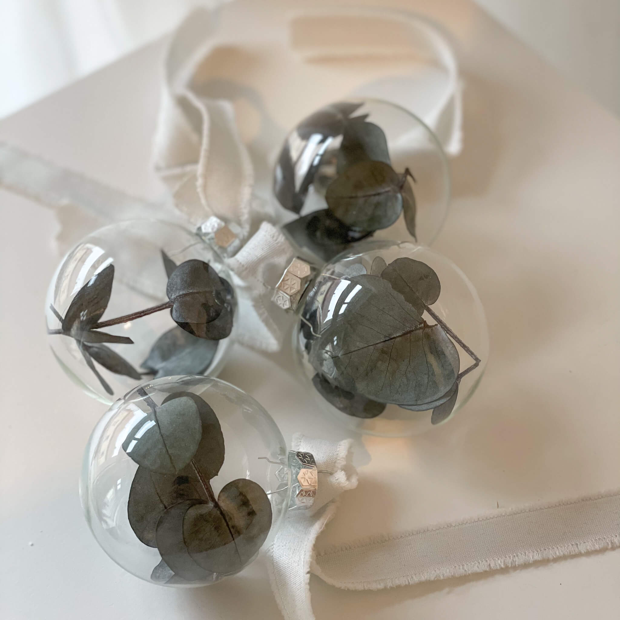 Glass Christmas balls - filled with dried flowers