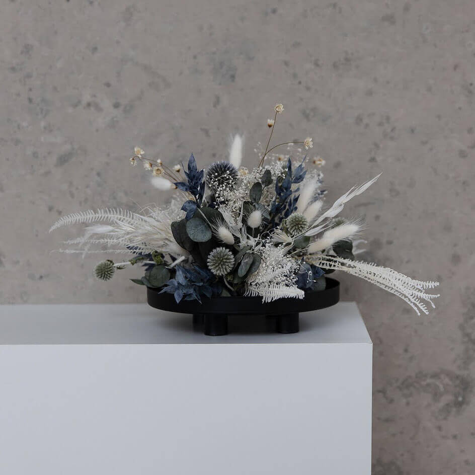 Elegance in blue and white: dried flower arrangement with eucalyptus