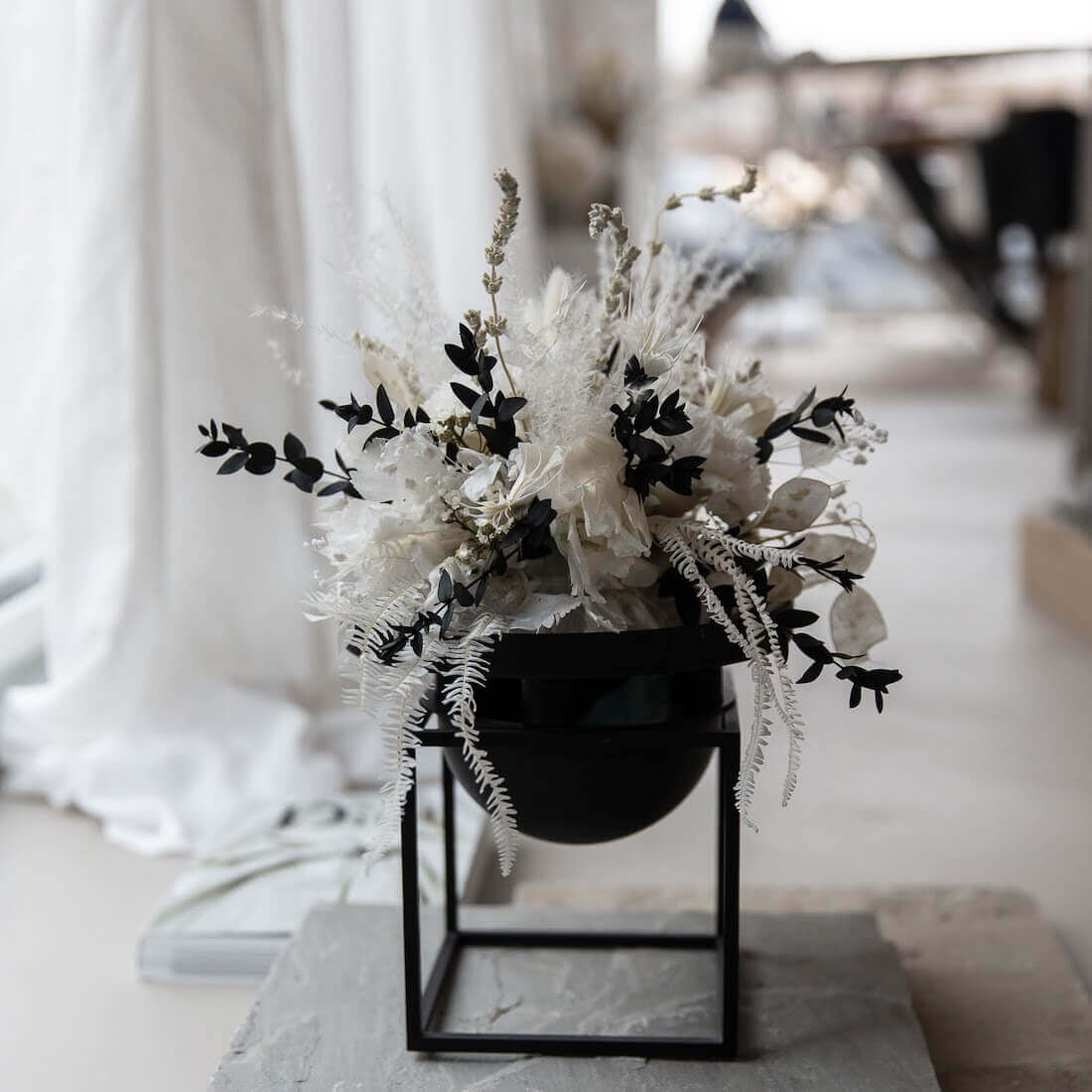 Elegance in blue and white: dried flower arrangement with eucalyptus