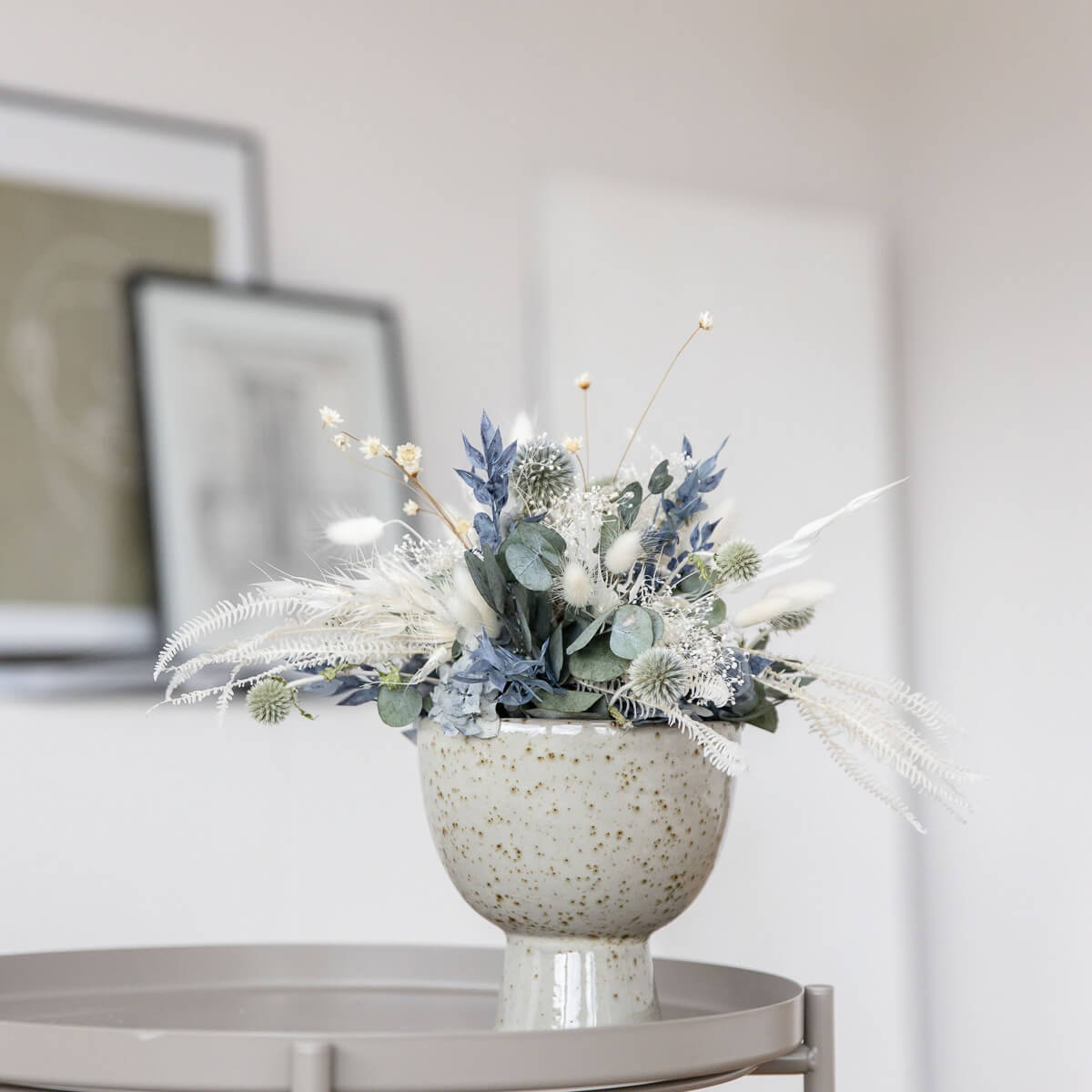 Elegance in blue and white: dried flower arrangement with eucalyptus